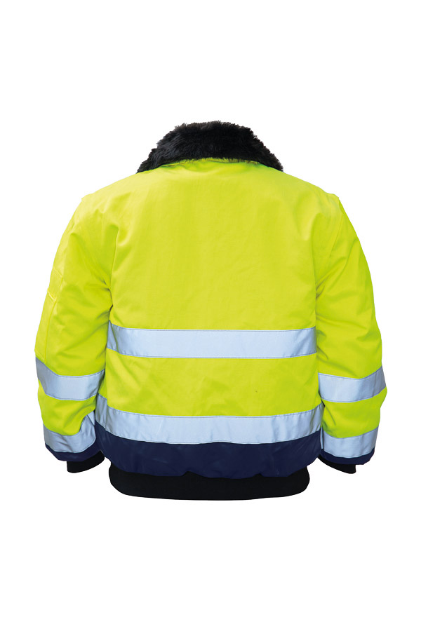 Ein Mann in einer signalgelb-schwarzen Korntex-Pilotenjacke steht vor einem Gebäude, high-visibility, jacke, reflektierende-bahnen, neon-gelb, futter-verstärkt