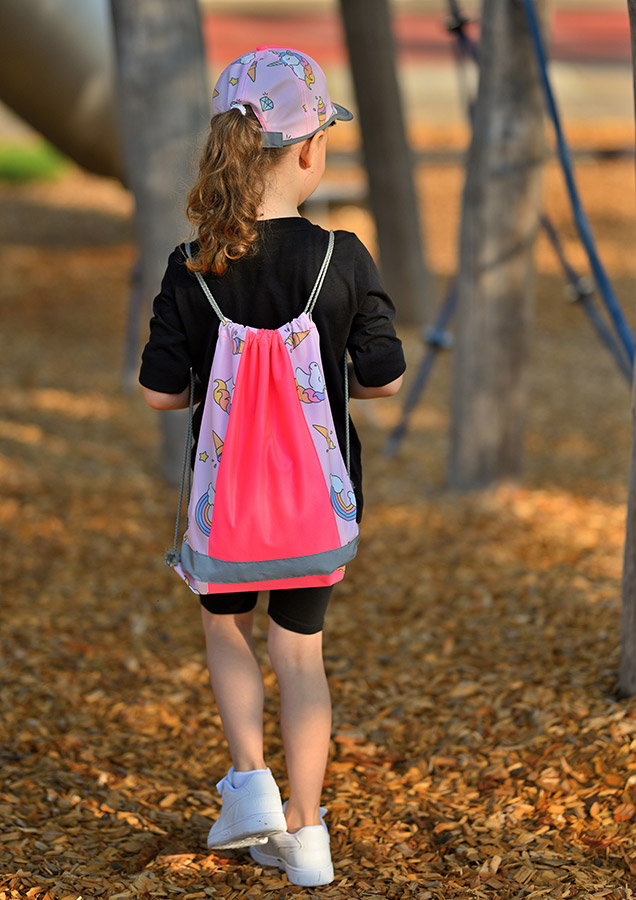 Korntex Sac de gym enfant GYMACT rose avec motif licorne et cordons réfléchissants, vue de face.